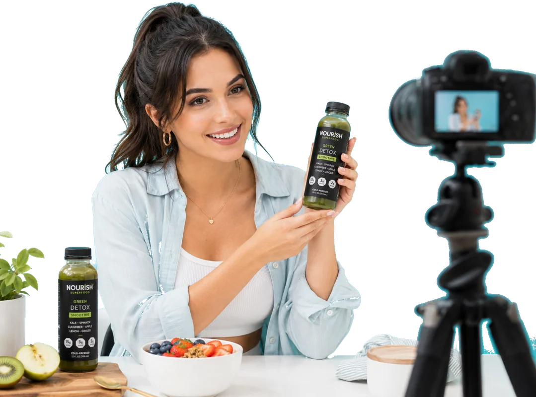 A wellness creator presenting a detox smoothie on camera